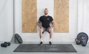 man wall sit