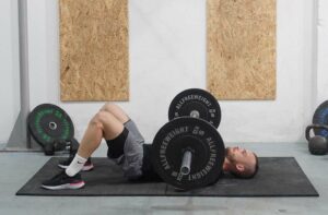 man floor press barbell